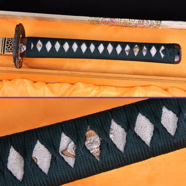 Handle & Menuki Closeup, 1060 Folded & Clay-Tempered Steel Curved Blade, Black Saya & Dark Green Sageo, Dark Green Handwrap & White Rayskin Underwrap Katana Sword Handle & Menuki Closeup, 1060 Folded & Clay-Tempered Steel Curved Blade, Black Saya & Dark Green Sageo, Dark Green Handwrap & White Rayskin Underwrap Katana Sword